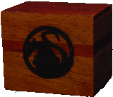 Ratling box in shedua with padauk lid and inlay.